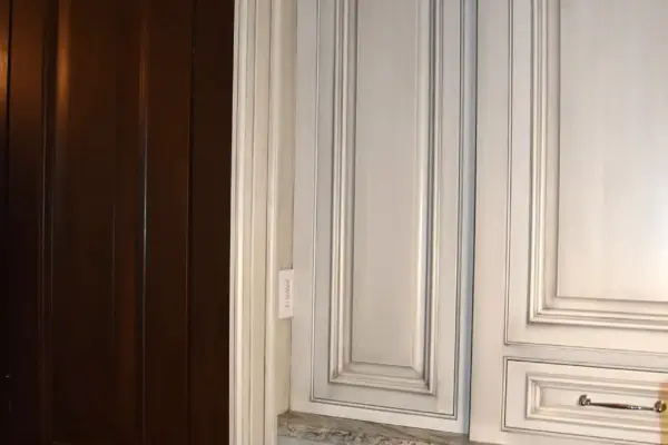 All woodwork was painted and then received an antique glaze strie technique.